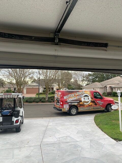 A Master's Touch service van in a Villages neighborhood